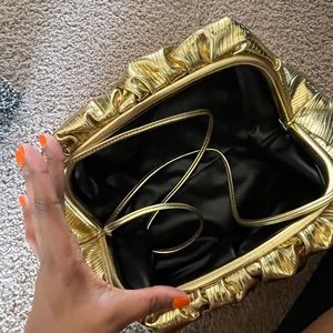 Gold clutch
